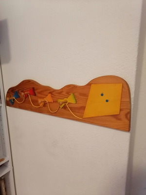 Vintage wooden children's wall hanger with kite design