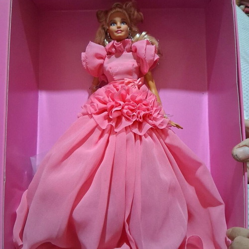 Barbie doll collectible like new with stand