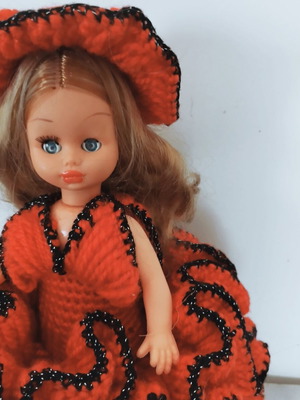 Vintage doll with embroidered dress like new, 32 cm