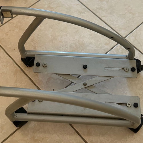 Metal computer tower stand used with wheels