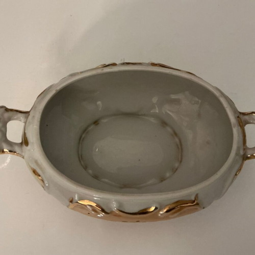 Vintage porcelain with gold details like new, collectible piece