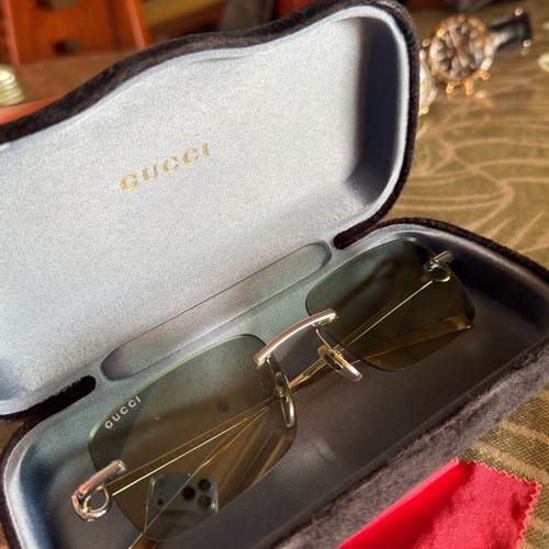 Gucci sunglasses with light blue lenses like new