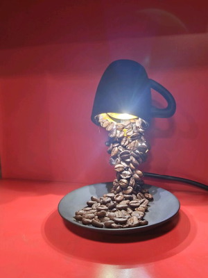 Handmade table lamp with porcelain, coffee beans, and 12 LED lights