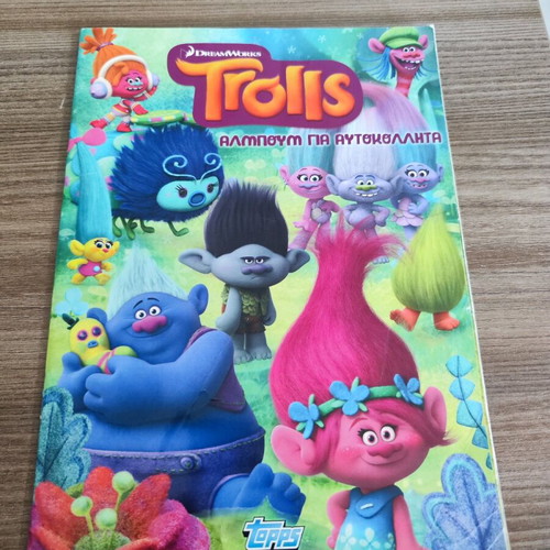 Trolls Topps sticker album used with 106 stickers attached
