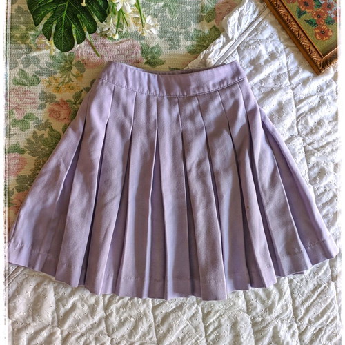 Mini skirt with pleats like new, pastel purple, size 34