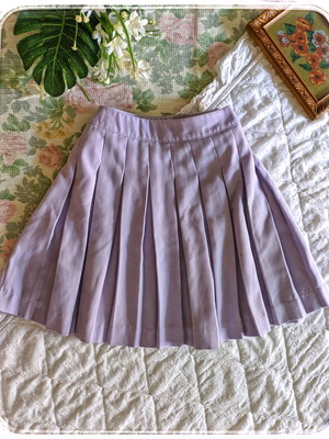 Mini skirt with pleats like new, pastel purple, size 34