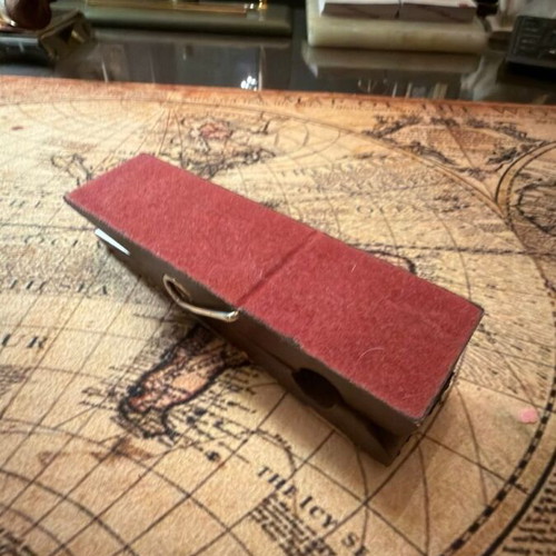 Vintage decorative desk clip with metal overlay used