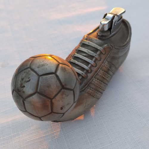 Sports collectible lighter shaped like a shoe with ball, like new