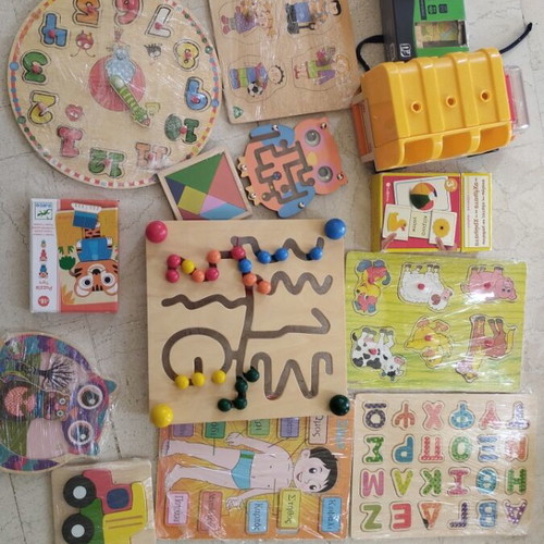 Wooden children's educational toys and puzzles