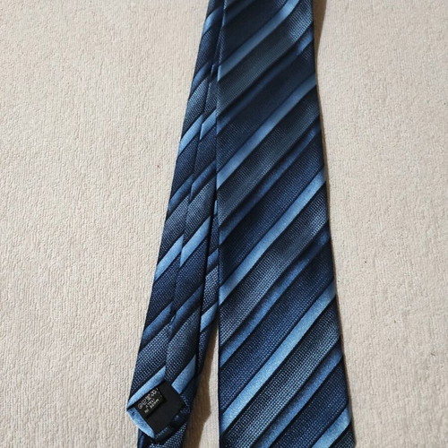 Blue tie with patterns like new, made in Italy
