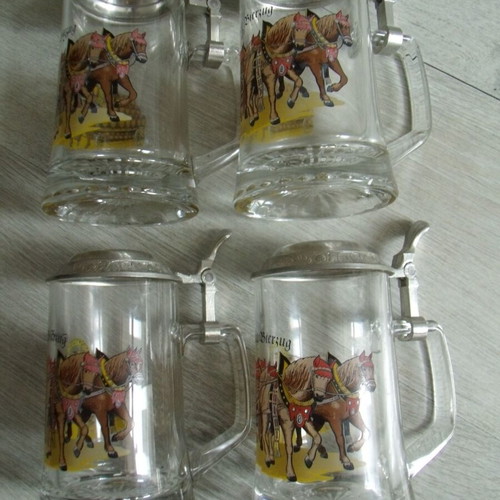 Set of 4 old glass beer steins with metal lids used