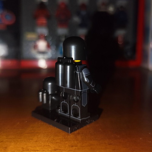 Black Astronaut minifigure with baby and base, Lepin