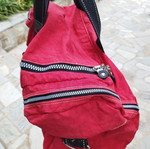 Travel sack with multiple compartments, red