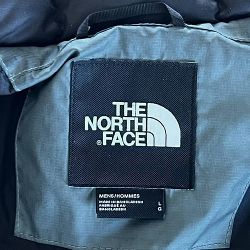 The North Face puffer jacket men’s size L like new, multicolor