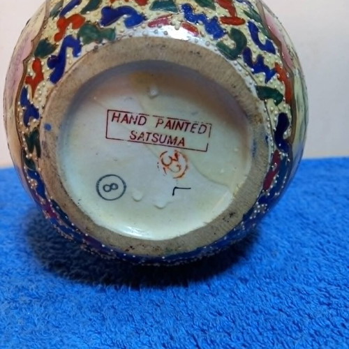 Satsuma vase used with handpainted floral motifs and crackle glaze