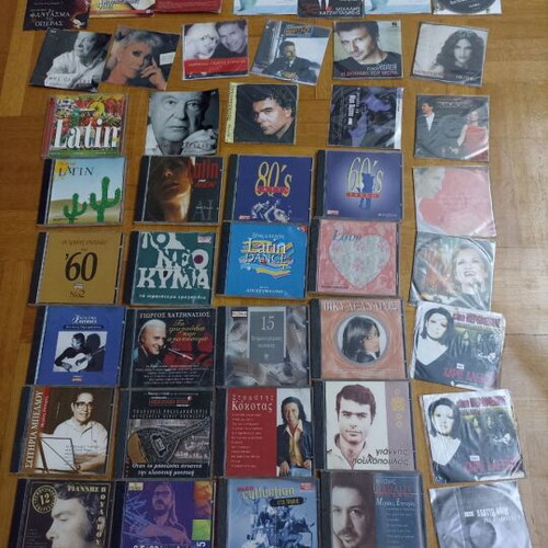 43 assorted DVDs with songs and movies