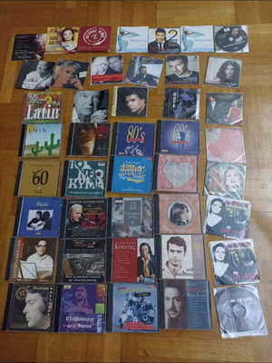 43 assorted DVDs with songs and movies