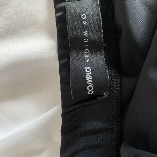 Complot black mini skirt size M like new