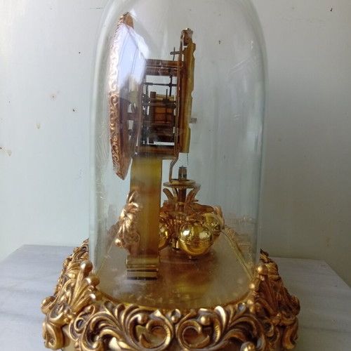 400-day mechanical clock with glass dome