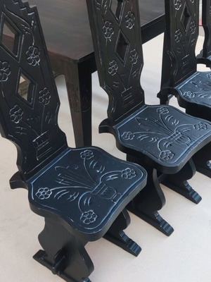 Carved furniture table with four chairs like new