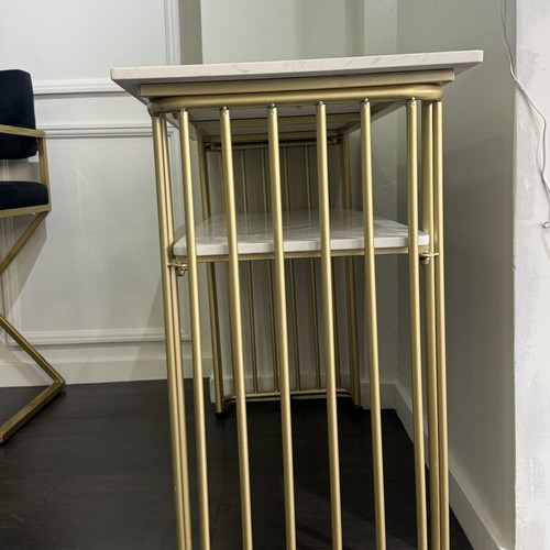 Desk console with metal frame and white marble-look surface