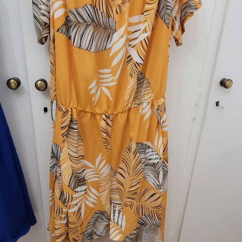 Selected orange one-piece romper with belt, size 46