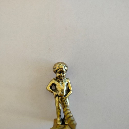 Brass corkscrew opener used with minor metal wear