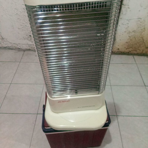 Halogen space heater used with 3 lamps 1,200W rotating