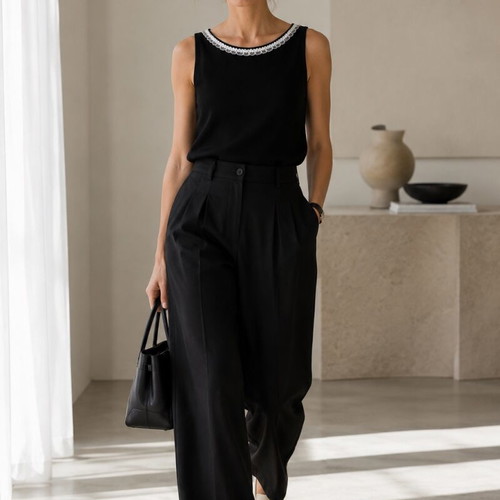 Fiorella black sleeveless top with romantic neckline and flowers size S like new