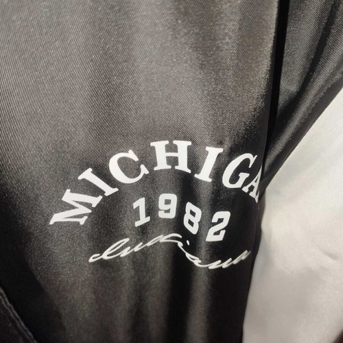 Only college style jacket like new, black and white, medium
