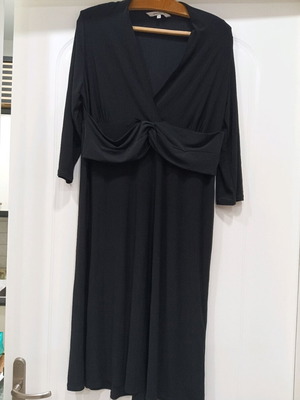 Women's dress size 44 used with minor repair needed