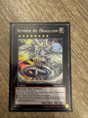 Number 46: Dragluon used YuGiOh card in moderate condition
