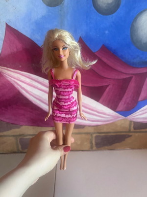 Mattel Barbie Beach doll with pink swimsuit and fuchsia dress