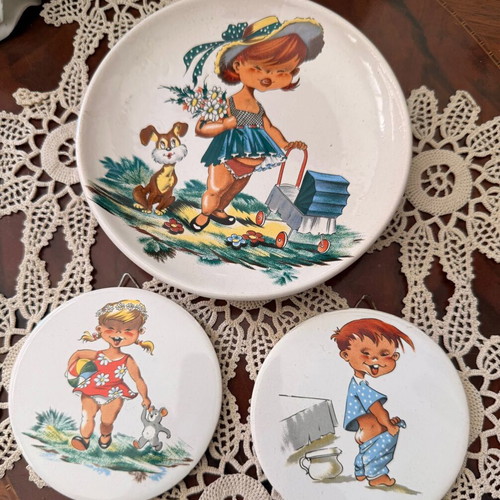 Ceramic vintage plates with children's figures used