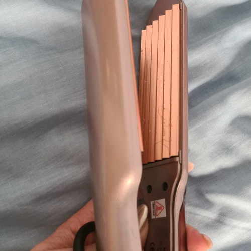 Hair straightener used that creates wavy hair