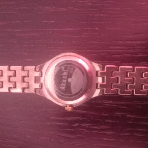 Akashi men's and women's watch set like new, gold and silver
