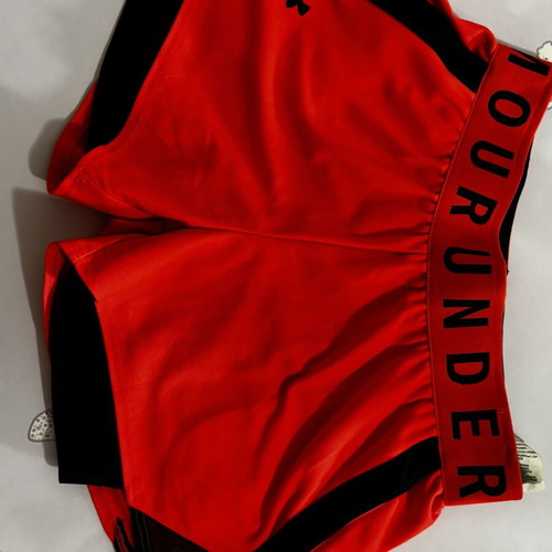 Under Armour shorts used, size S, pink