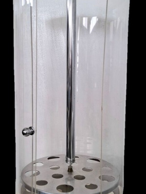 Plexiglass cone display case used, rotating with door, 15 slots