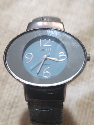 Suisse Quartz women's watch like new, silver and turquoise leather strap