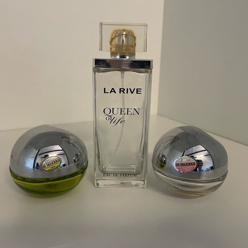 Collection of 44 empty genuine perfume bottles, various brands