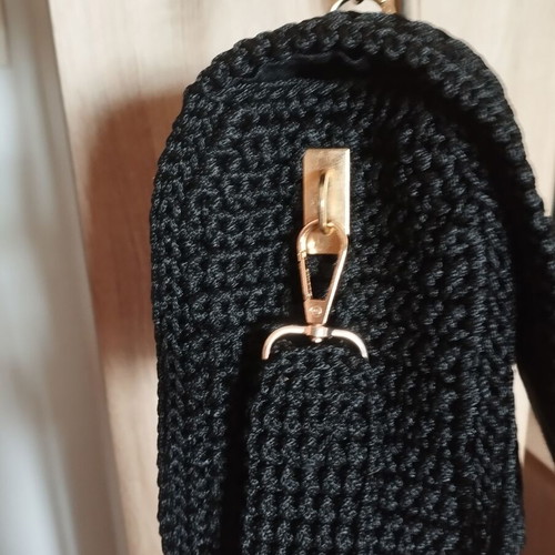 Knitted black handbag with gold accessories, handmade