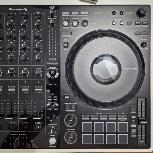 Pioneer DDJ-FLX10 DJ controller used with soft case and music collection