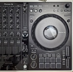 Pioneer DDJ-FLX10 DJ controller used with soft case and music collection
