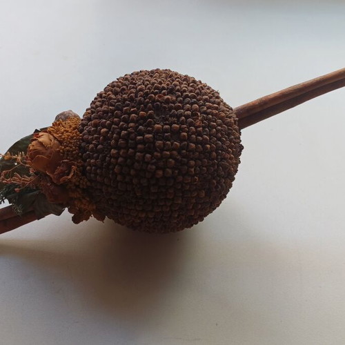 Decorative cinnamon wood and cloves ornament used