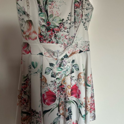One-piece shorts like new, white and multicolor, adjustable straps