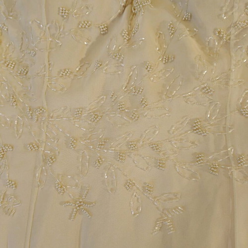 Maxi dress in butter yellow color with straps and embroidery