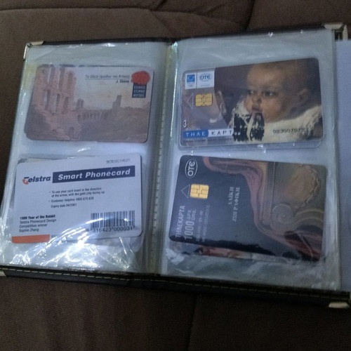 Collectible old phone cards with album used