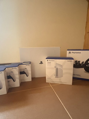 PlayStation 5 Pro 2TB with 3 DualSense controllers, Logitech G29 wheel, Disc Drive