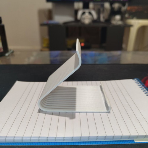 White phone and tablet stand