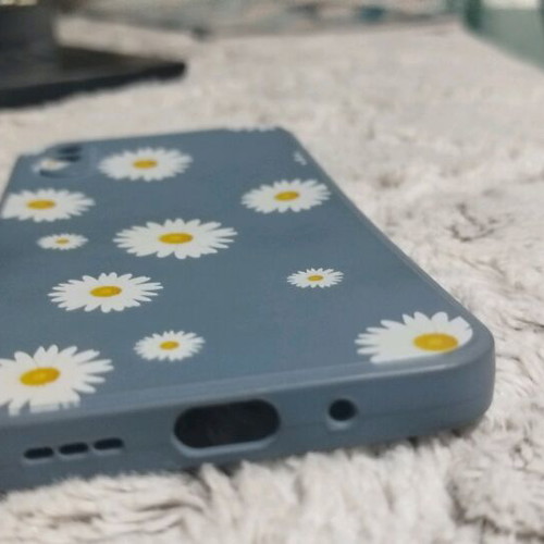Redmi 9a case used, blue with silicone daisies
